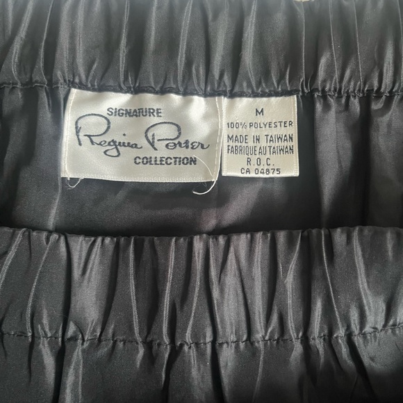 Signature Black Maxi tiered Skirt
Satin taffeta fabric - Picture 3 of 5